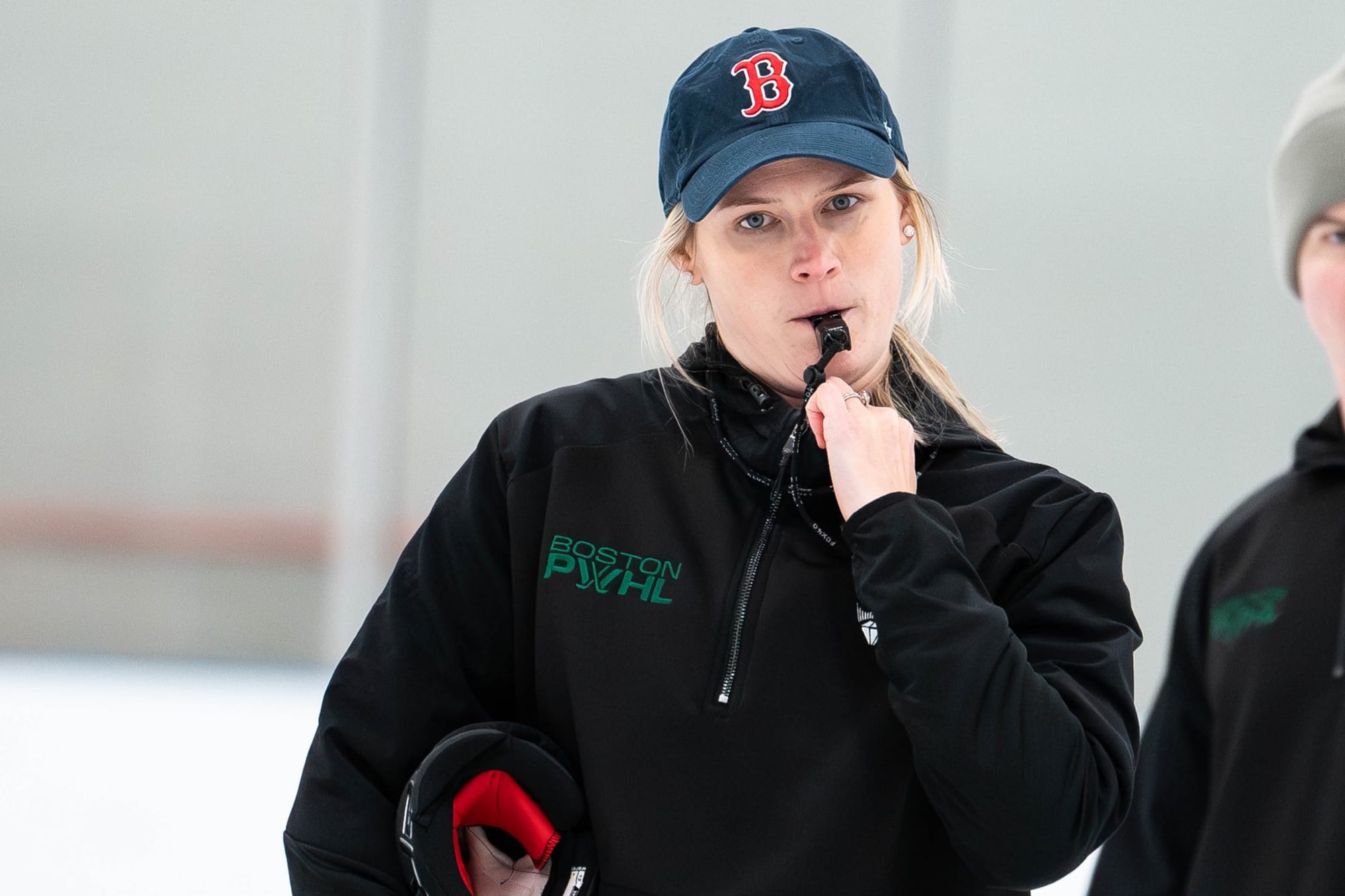 Courtney Kessel blows her whistle during a PWHL Boston practice