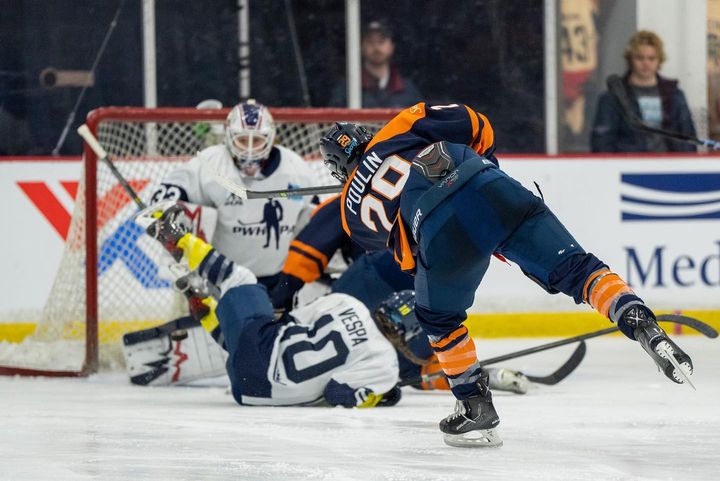 Marie-Philip Poulin takes a shot