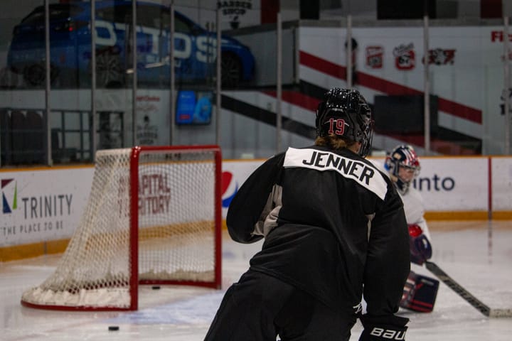 Brianne Jenner skates away from the camera at a practice.