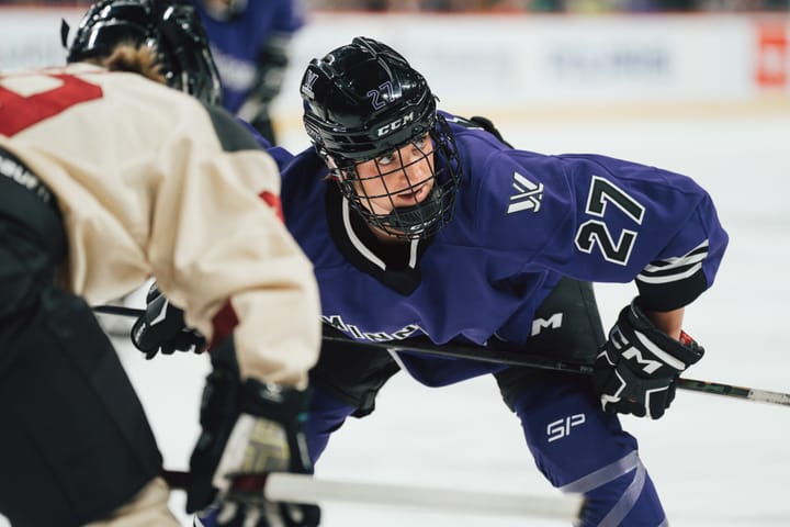 Taylor Heise of Minnesota lines up for a faceoff