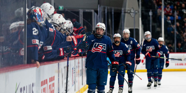 Team USA celebrates a goal with their bench (Cred: USA Hockey)