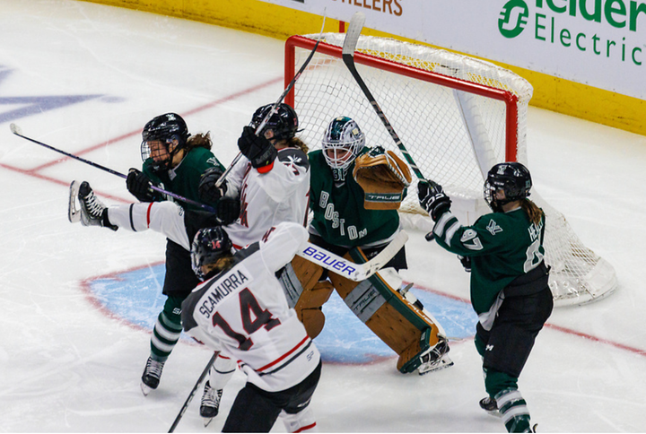 Two Boston players battle two Ottawa players for positioning in front of Frankel. Boston is in green, Ottawa in white. 