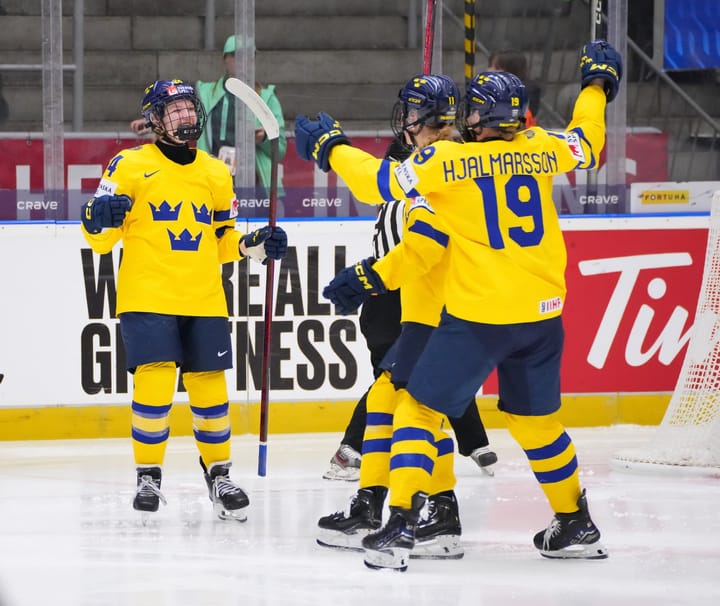 Sweden celebrates a goal at Women's Worlds. Photo: IIHF
